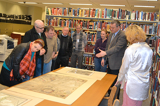 James Akerman showing maps of the Atlantic world to the group in the Library of Congress Geography and Map Reading Room.
